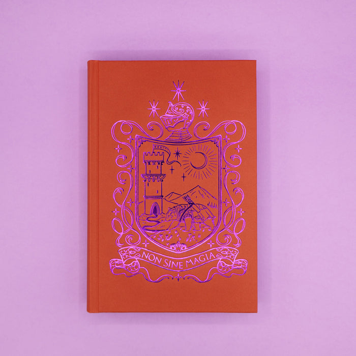 The orange hardcase of 'Graceless Heart' with purple foil crest and text on a purple background
