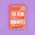 Book cover of 'The Dead Romantics' by Ashley Poston on a purple background