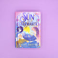 Book cover of 'The Sun and the Starmaker' by Rachel Griffin on a purple background